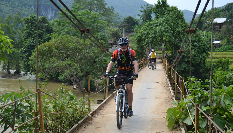 Suspension bridge to village in Niem Son